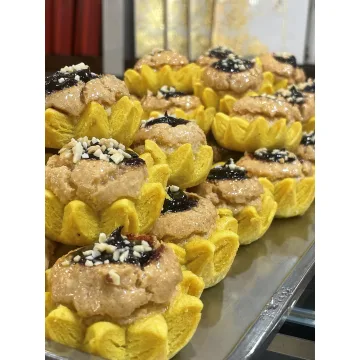 شیرینی مغزدار زعفرانی گل آفتابگردان | خرید شیرینی مجلسی تازه