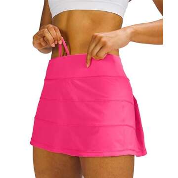 MEIVSO Women's Pleated Workout Tennis Skirts with Pockets Activewear Sports Skort Built-in Shorts Pink M