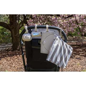 Ubbi Retractable On-the-Go Diaper Bag Dispenser with 36 Lavender Scented Refill Bags for Baby Travel