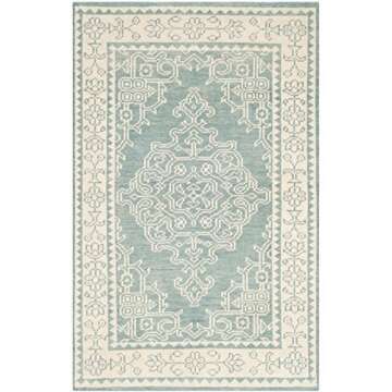 SAFAVIEH Kenya Collection Area Rug - 6' x 9', Ivory & Blue, Hand-Knotted Oriental Medallion Wool, Ideal for High Traffic Areas in Living Room, Bedroom (KNY638A)