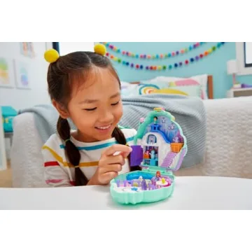 Polly Pocket Dolls & Playset, Snow Sweet Penguin Compact with 13 Accessories, Travel Toy with Fidget Exterior