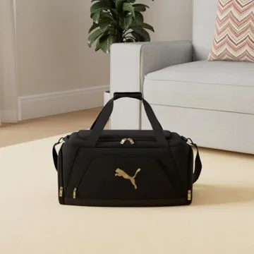 PUMA Accelerator Duffel Bag in Black/Gold - One Size