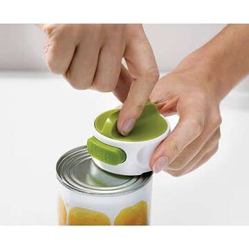 Joseph Joseph Can-Do Compact Can Opener Easy Twist Release Portable Space-Saving Manual Stainless Steel, Green