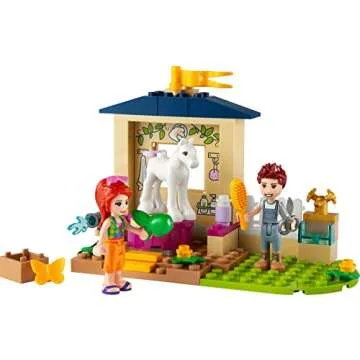 LEGO Friends Pony-Washing Stable 41696 Horse Toy with Mia Mini- Doll, Farm Animal Care Set, Gift Idea for Kids, Girls and Boys 4 Plus Years Old