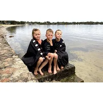 DOWN UNDER OUTDOORS Large Waterproof Windproof Extra Thick 350 GSM Quilted Fleece Stadium Blanket, Machine Washable Camping Picnic & Outdoor, Beach, Baseball,Dog, 82 x 55 (Black & White Check)