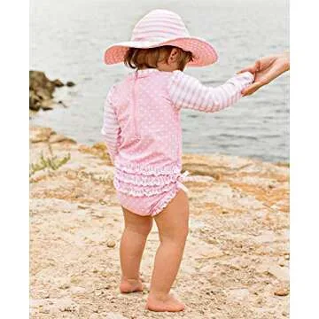 RuffleButts Baby Girls UPF 50+ Sun Protection Polka Dot Long Sleeve One Piece Rash Guard Swimsuit with Zipper - Pink Polka, 12-18m