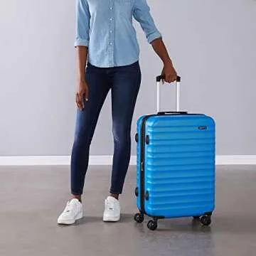 Amazon Basics 26-Inch Hardside Checked Luggage, Hardshell Suitcase With Wheels, Expandable For Up to 15% More Space, With Scratch-Resistant Surface, Four Multi-directional Wheels, Light Blue
