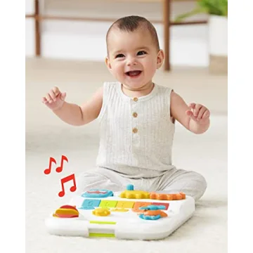 Skip Hop 4-in-1 Baby Walker Light Up Music Toy 40+ Activities