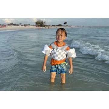 KIDSco Swim Vest for Kids 30-50 lbs | Toddler Swimming Aid with Shoulder Strap and Water Wings | Cute Swim Floaties for Boys and Girls 2 to 6 Years for Pool and Beach (Tan Checkerboard)
