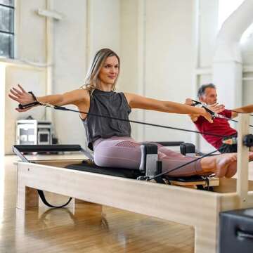 Balanced Body Studio Reformer, Pilates Exercise Equipment with Classic Footbar, Workout Equipment for Home or Studio, Black Upholstery
