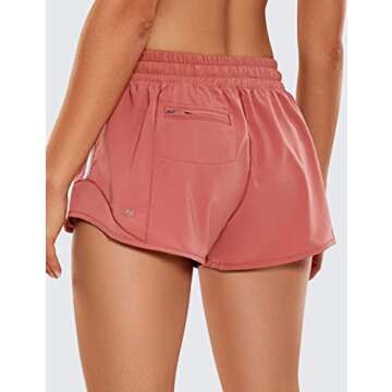 CRZ YOGA Athletic Shorts for Women with Zip Pocket, 2.5" Mid Waist Mesh Liner Shorts for Running Gym Workout Red Bronzer Small