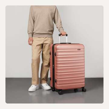 Amazon Basics 30" Expandable Hardside Suitcase in Rose Gold