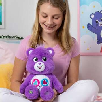 Care Bears 14" Share Bear Plushie - Medium Size - Purple Plush for Ages 4+ – Perfect Stuffed Animal Holiday, Birthday Gift, Super Soft and Cuddly – Good For Girls and Boys, Employees, Collectors