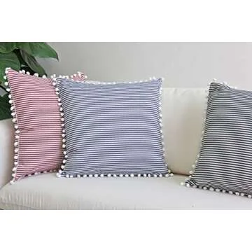 JOJUSIS Farmhouse Ticking Stripe Throw Pillow Covers with Pom-poms Red and White Outdoor Decorative Couch Pillowcases Cushion Covers Set of 2 20 x 20 Inch