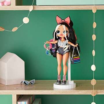 L.O.L. Surprise! OMG Movie Magic Starlette Fashion Doll with 25 Surprises Including 2 Outfits, 3D Gl...