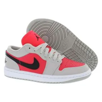 Nike Women's Air Jordan 1 Low UNC Basketball Shoe, Black/University Blue-white, 8.5