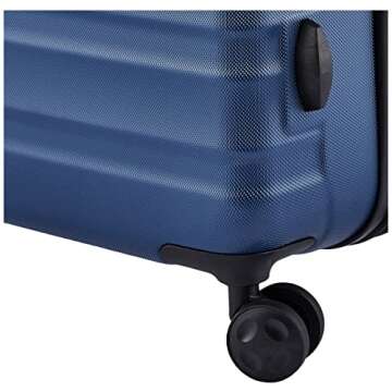 Amazon Basics 26-Inch Hardside Checked Luggage, Hardshell Suitcase With Wheels, Expandable For Up to 15% More Space, With Scratch-Resistant Surface, Four Multi-directional Wheels, Navy Blue