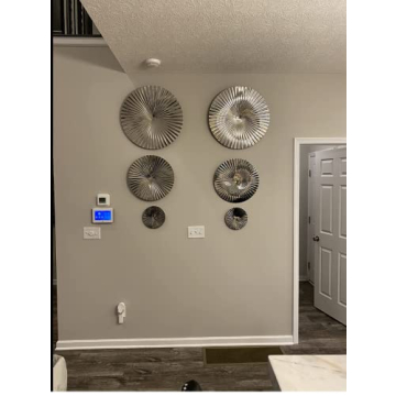 Decorlives Round Sunburst Metal Wall Art for Contemporary Homes