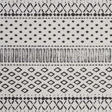 Amazon Brand – Rivet Contemporary Geometric Area Rug, 5' 11" x 3' 11", Ivory, Black