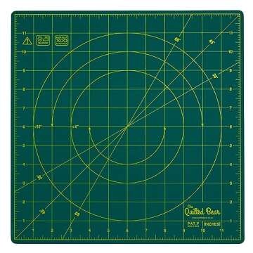 The Quilted Bear 360° Rotating & Lockable Self Healing Cutting Mat 12" x 12" with 45mm Rotary Cutter - Green: Your Ultimate Crafting Companion for Precision and Convenience.