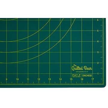 The Quilted Bear 360° Rotating & Lockable Self Healing Cutting Mat 12" x 12" with 45mm Rotary Cutter - Green: Your Ultimate Crafting Companion for Precision and Convenience.