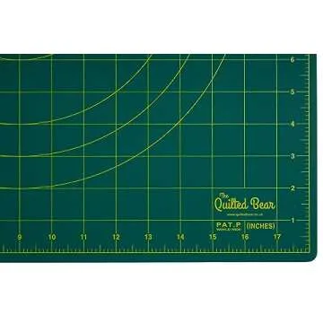 The Quilted Bear 360° Rotating & Lockable Self Healing Cutting Mat 12" x 12" with 45mm Rotary Cutter - Green: Your Ultimate Crafting Companion for Precision and Convenience.