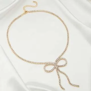 Elegant FAMARINE Gold Bow Necklace with Zirconia Sparkle