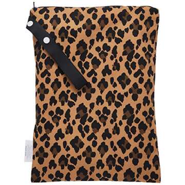 Itzy Ritzy Sealed Wet Bag with Handle – Wet Bag for Travel, Swimsuits, Cloth Diapers, Gym Clothes & Toiletries - Washable & Reusable with Water Resistant Lining - Measures 11” x 14” (Leopard)