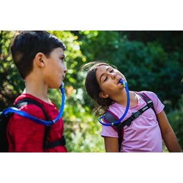 CamelBak Mini M.U.L.E. Kids Hydration Backpack for Hiking and Biking - 50oz, Green/ Mountains