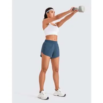 CRZ YOGA Mid Waisted Dolphin Athletic Shorts for Women 4" Lightweight High Split for Gym Workout with Liner Quick Dry Stelindigo Small