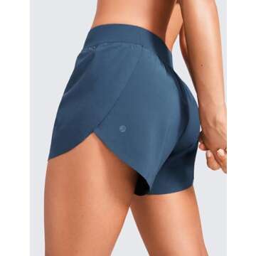 CRZ YOGA Mid Waisted Dolphin Athletic Shorts for Women 4" Lightweight High Split for Gym Workout with Liner Quick Dry Stelindigo Small