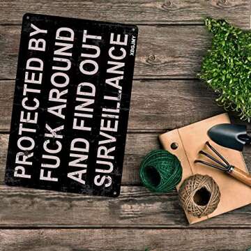 XBGJMY Protected by Fuck Around and Find Out Surveillance Signboards of Metal Funny Vintage Tin Sign 12 x 8 Inch Wall Art Decor Iron Poster for Rustic Home Farmhouse Bar Pub Cafe Garage Man Cave Gifts