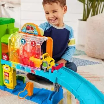 Fisher-Price Little People Toddler Toy Light-Up Learning Garage, Electronic Playset with Car & Figur...
