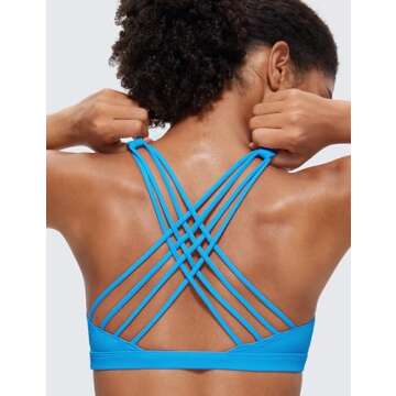 CRZ YOGA Strappy Sports Bras for Women - Criss Cross Back Wireless Padded Yoga Workout Cami Top Madagascar Blue Small