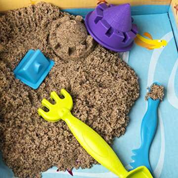 Kinetic Sand, Beach Day Fun Playset with Castle Molds, Tools and 12 oz. of All-Natural Kinetic Beach Sand, Play Sand Sensory Toys for Kids Ages 3 and up