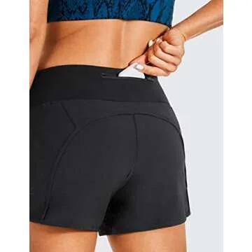 CRZ YOGA Womens Lightweight Gym Athletic Workout Shorts Liner 4" - Quick Dry Running Sport Spandex Shorts Mesh Zipper Pockets Black Medium