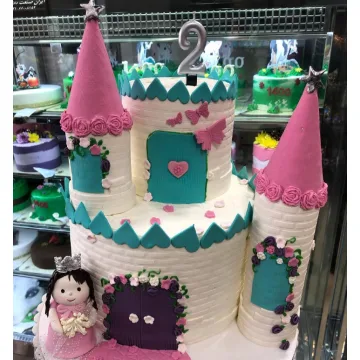 کیک تولد قلعه پرنسسی صورتی فیروزه‌ای دخترانه عروسک دس?...