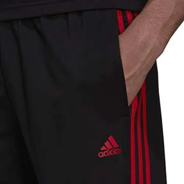 adidas Men's Essentials Warm-up Open Hem 3-stripes Tracksuit Bottoms, Black/Scarlet, Small/31" Inseam