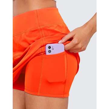 CRZ YOGA Womens High Waisted Tennis Skirts with 3 Pockets Golf A Line Lightweight Cute Athletic Casual Skorts Neon Orange XX-Small