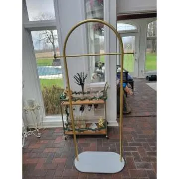 Stylish Gold Garment Rack with Marble Base for Elegant Spaces