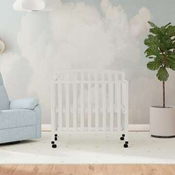 DaVinci Dylan Folding Portable 3-in-1 Convertible Mini Crib and Twin Bed in White, Greenguard Gold C...