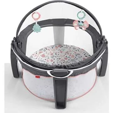 Fisher-Price Portable Bassinet On-The-Go Baby Dome, Travel Play Space with Developmental Newborn Toys & Canopy, Pink Pacific Pebble