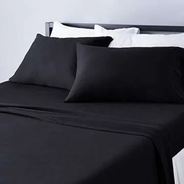 Amazon Basics 4 Piece Bed Sheet Set, 100% Cotton Jersey, Includes Super Soft, Flat and Fitted Sheets, Pillowcase, Queen, Black, Solid