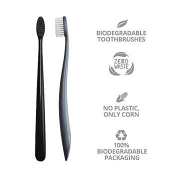 The Natural Family Co. Bio Toothbrush, Soft Nylon Bristles with Non GMO Cornstarch Handles, Plastic Free Packaging and Pirate Black and Monsoon Mist Twin Pack