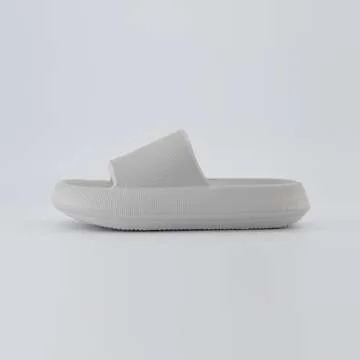 CUSHIONAIRE Feather Slides – Comfortable Cloud Cushion House Slippers for Women, Indoor Outdoor EVA Foam Foot Spa Shower Shoes, Non-Slip Arch Support, LIGHT GRAY 6