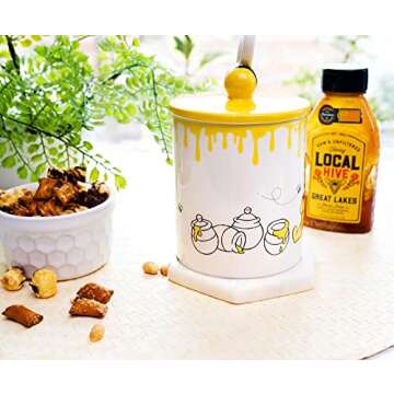 Silver Buffalo Disney Winnie the Pooh Eating Honey Ceramic Mug with Sculpted 3D Bee Lid, 18 Ounces
