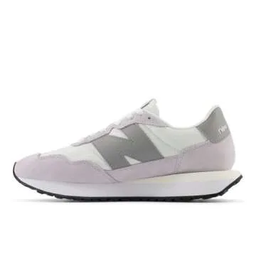 New Balance Women's 237 V1 Sneaker - Stylish Pink Comfort in Size 7.5