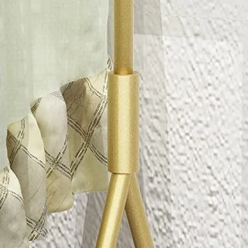 Stylish HOMEKAYT Gold Clothing Rack on Wheels