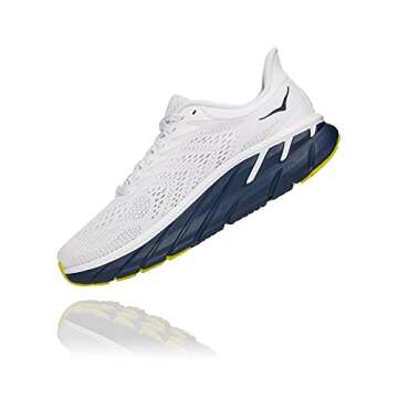 Hoka 1110509-BDBBI: Women's Clifton 7 Blanc De Blanc/Black Iris Running Shoe (6.5 B(M) US Women)