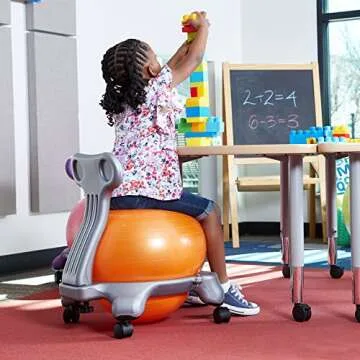 Gaiam Kids Balance Ball Chair - Classic Children's Stability Ball Chair, Alternative School Classroom Flexible Desk Seating for Active Students with Satisfaction Guarantee, Grey/Orange , 35cm